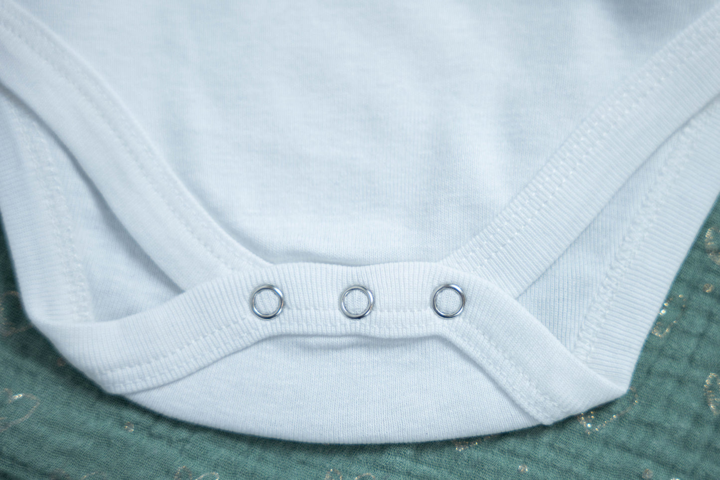 Un body pour envelopper bébé dans la douceur et l'amour infini