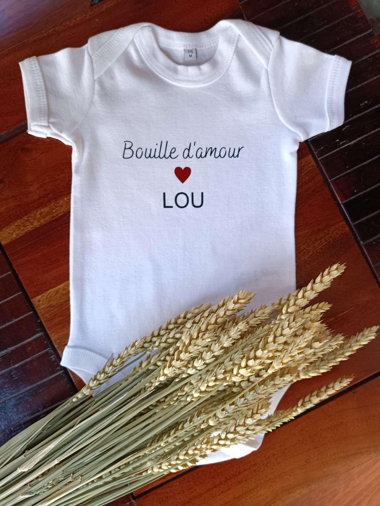 Body blanc personnalisé : douceur et émotion pour bébé